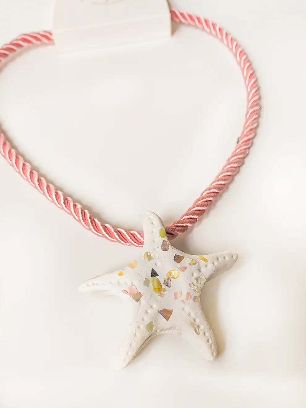 Mar de Rosas – Collar estrella de mar artesanal