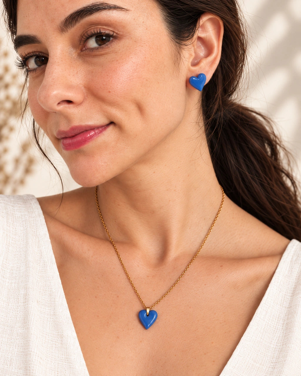 Detalle del arete y collar Corazón Azul C97