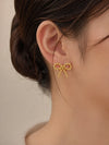 Lazo Chic – Aretes dorados en acero inoxidable