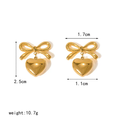 Encanto Dorado – Aretes lazo y corazón en acero