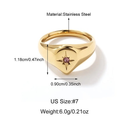 Corazón Estelar – Anillo dorado con circonia rosa