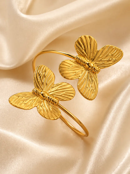 Encanto Alado – Pulsera elegante en acero dorado