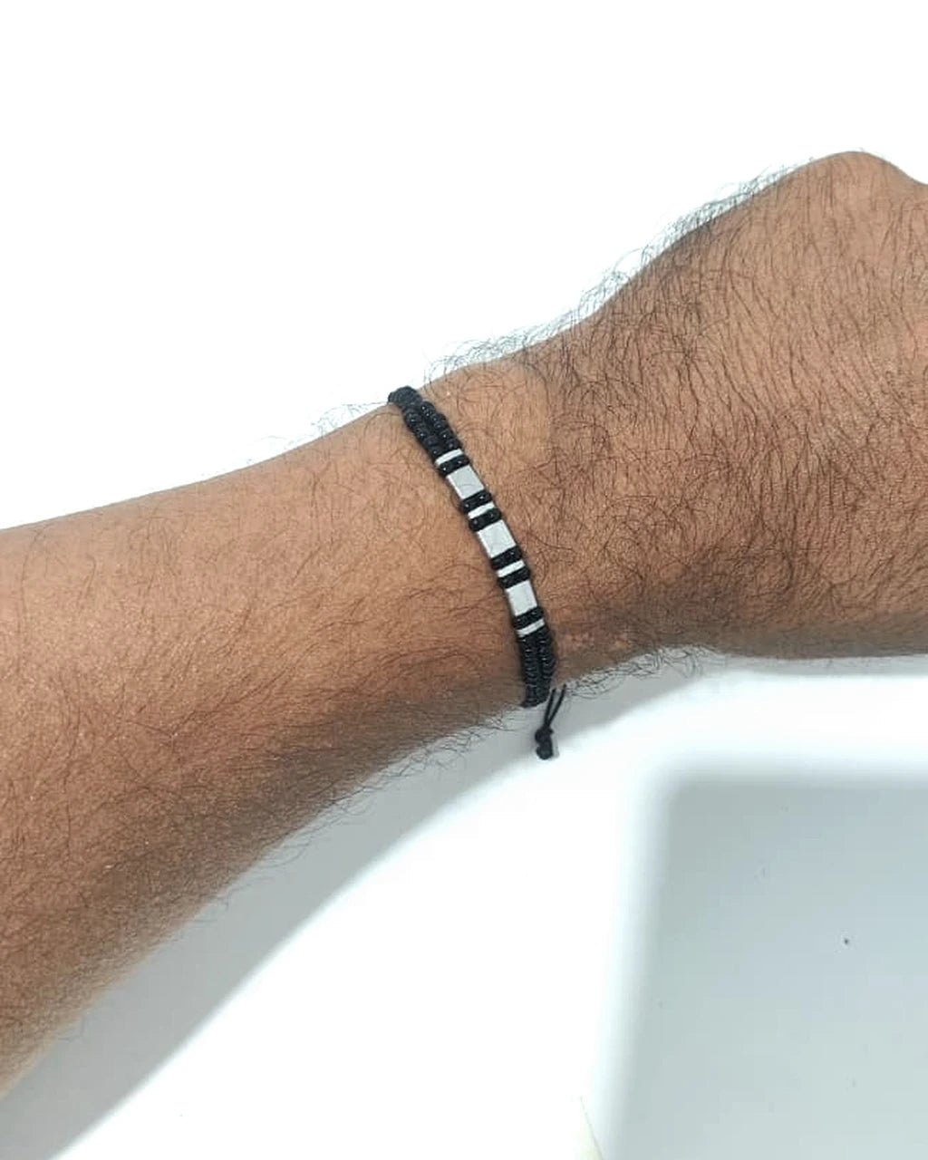 Ritmo Urbano pulsera sobre etiqueta