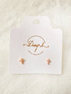 Cruz Minimal – Aretes topo dorado con circones