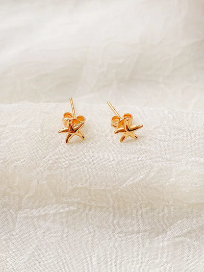 Estrella de Mar Chic – Aretes topo dorado