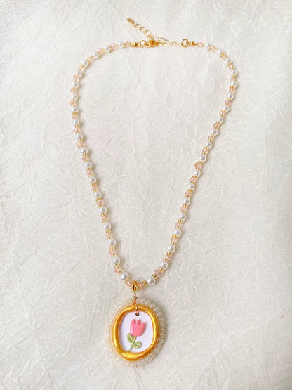 Luz de Jardín – collar perlas y dije en arcilla polimérica
