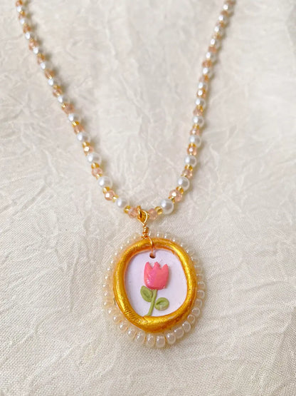 Luz de Jardín – collar perlas y dije en arcilla polimérica