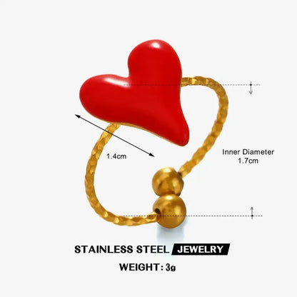 Pasión Sutil – Anillo dorado en acero inoxidable con diseño de corazón