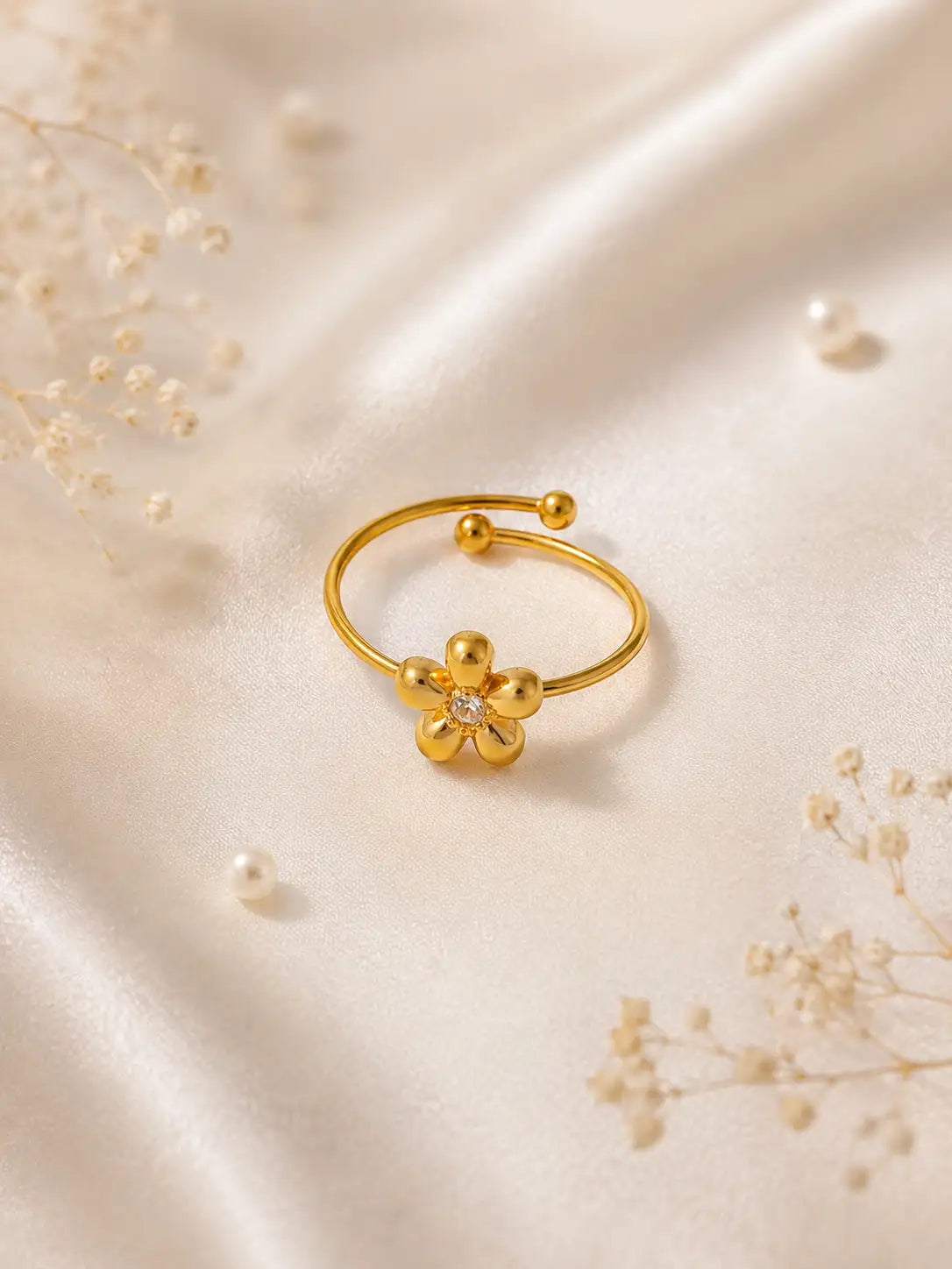 Flor Radiante – Anillo ajustable en acero inoxidable con flor dorada