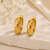 Noche Dorada – Aretes en acero con detalles brillantes