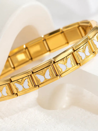 Mariposas de Luz – Pulsera dorada en acero inoxidable