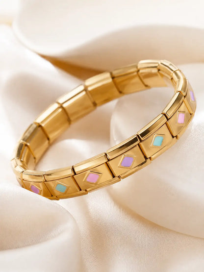 Dulce Geometría – Pulsera dorada con detalles esmaltados