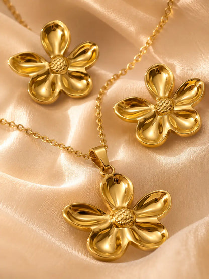 Flor Radiante – Set dorado con collar y aretes