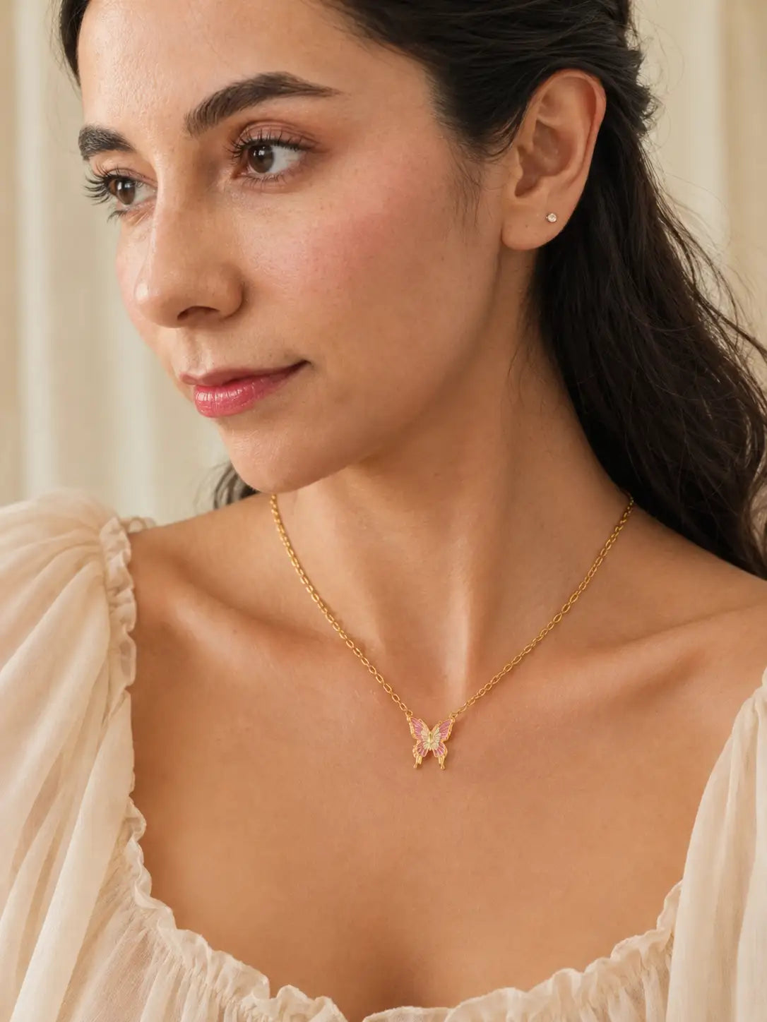 Mariposa Rosa – Collar dorado en acero inoxidable