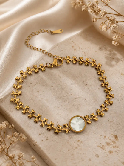 Luz de Flor – Pulsera ajustable en acero dorado