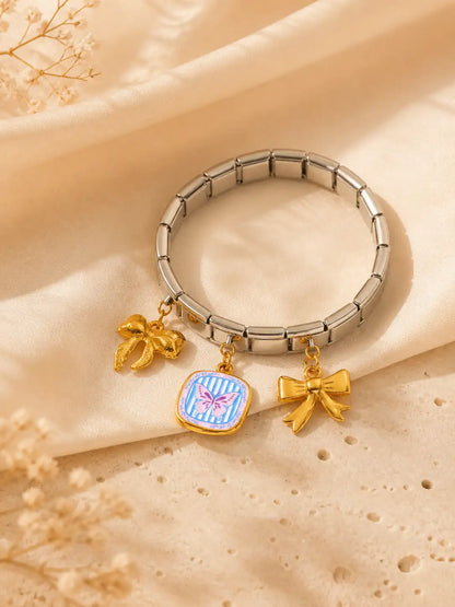 Lazo Pop – Pulsera en acero elástica con charms
