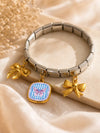 Lazo Pop – Pulsera en acero elástica con charms